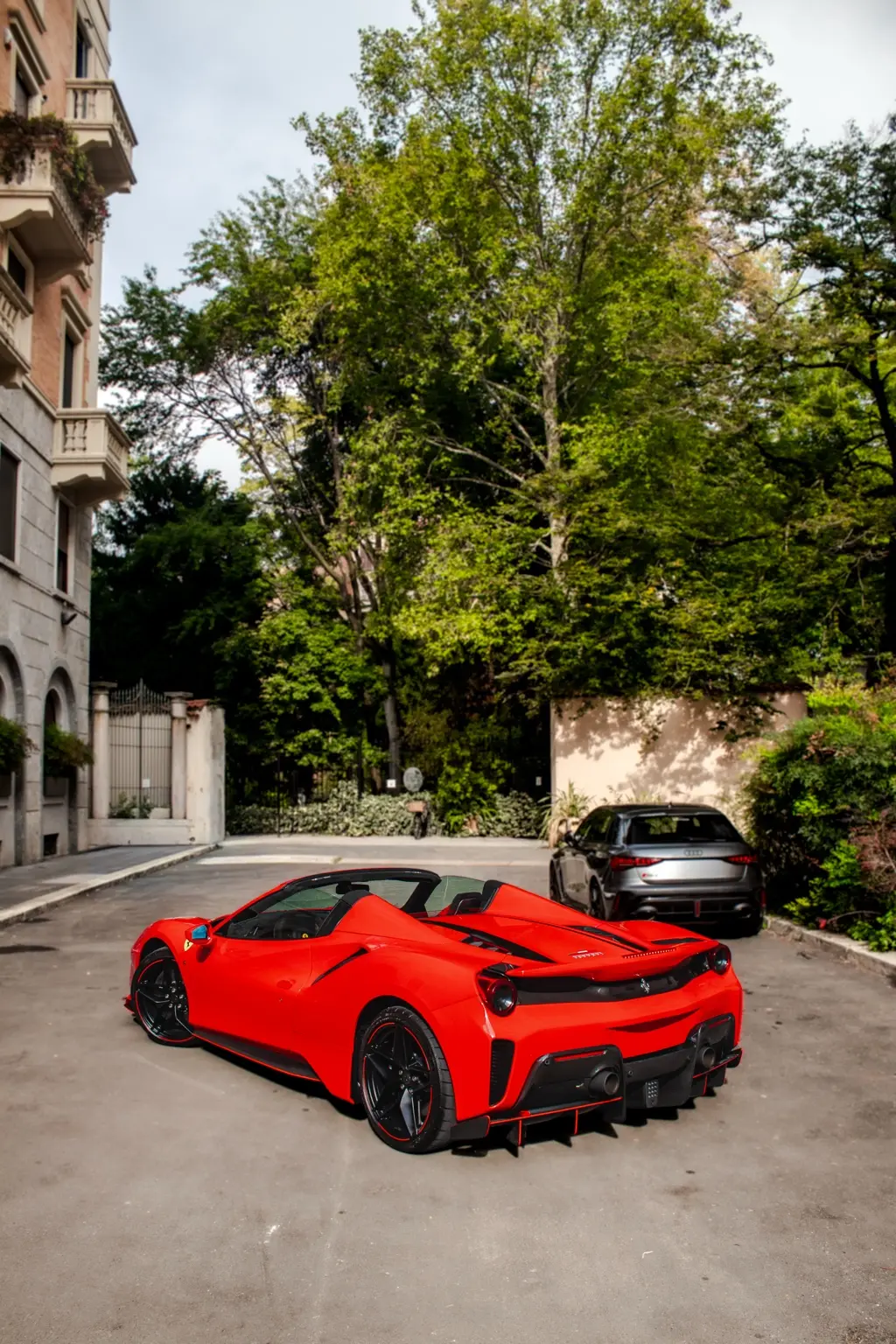 Rear view of the Ferrari on a Milan street