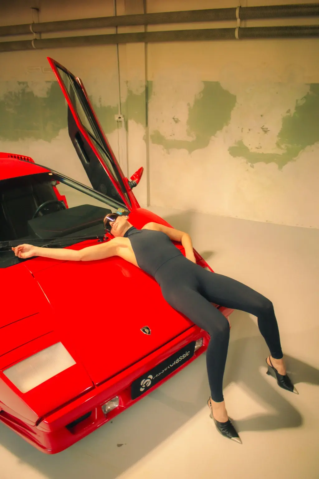 Alyona posed across the Countach bonnet