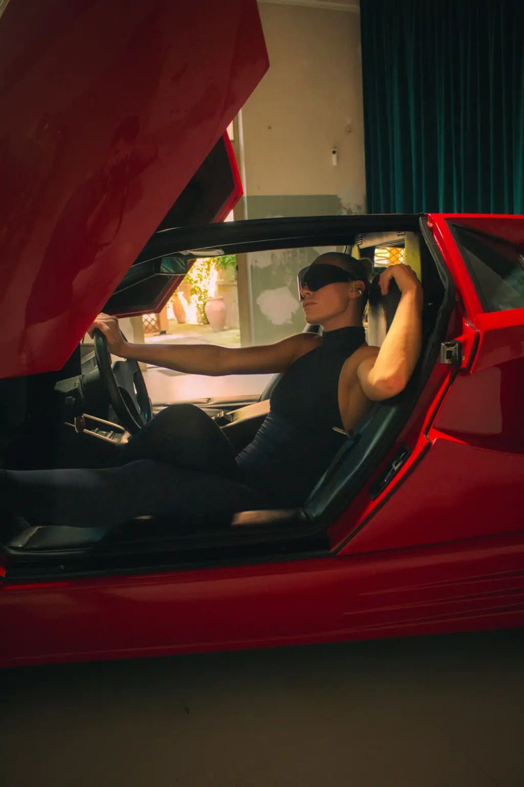 Alyona inside the Lamborghini Countach cockpit