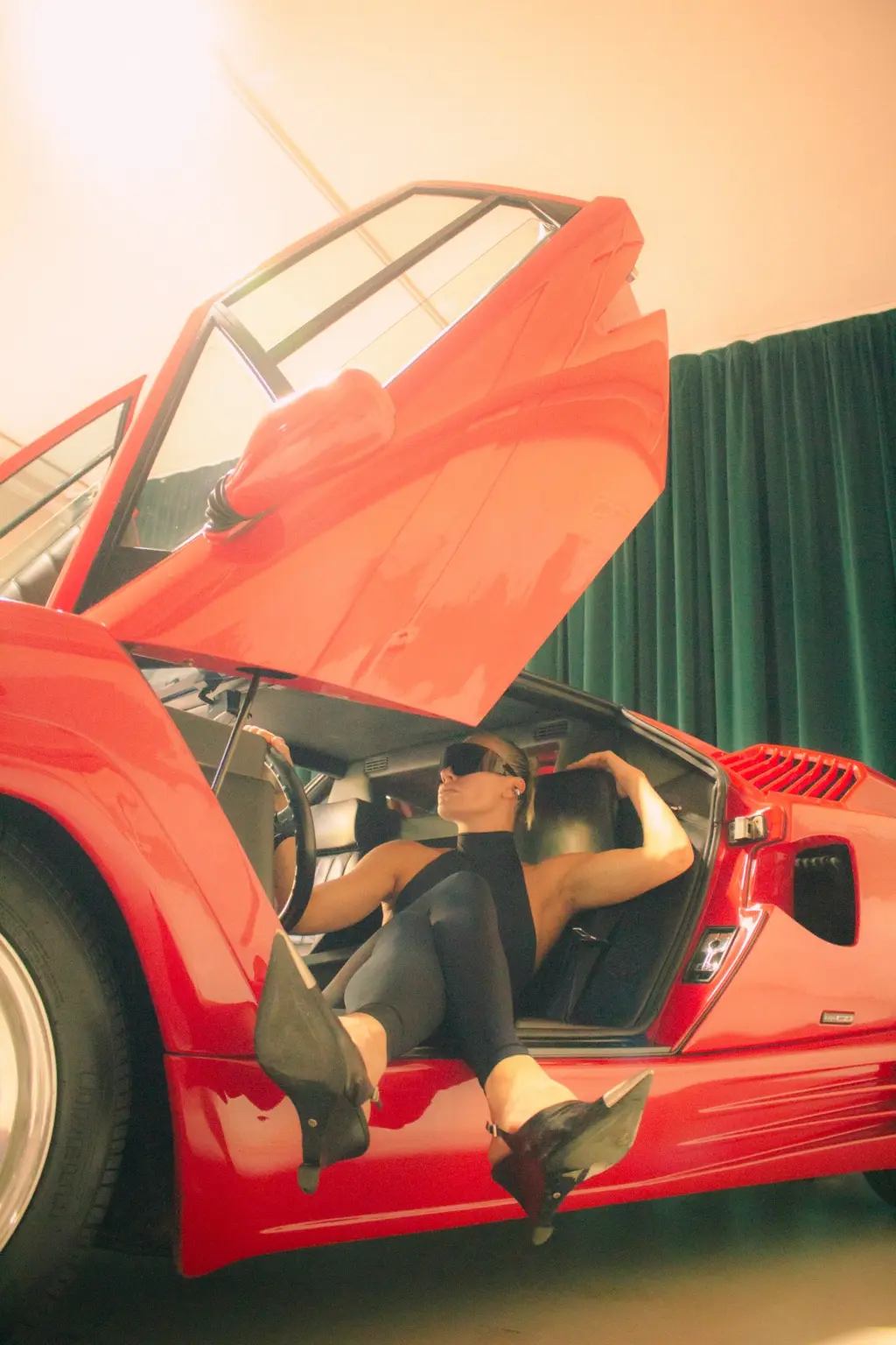 Open Countach door in warm studio light